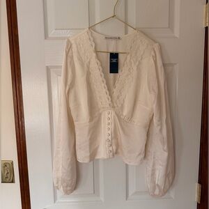 NWT Abercrombie & Fitch Cream Silky Button-Down Blouse Size M - small stain